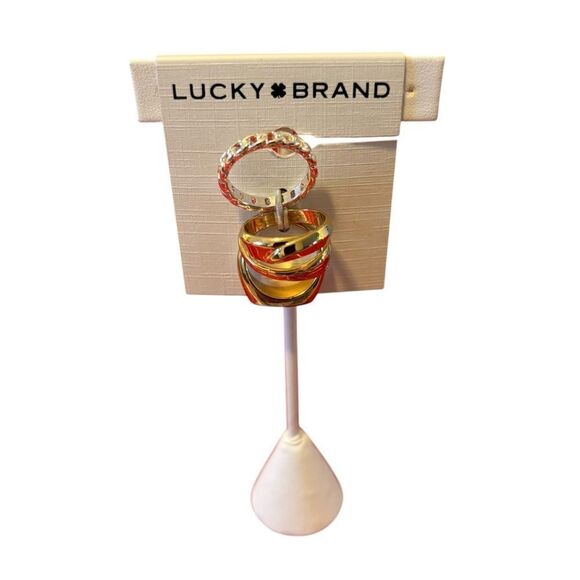 Two Tone Jeweled Ring Stack Set. 4 Rings in total. 3 in Gold Tone, 1 in Silver. - Picture 5 of 6